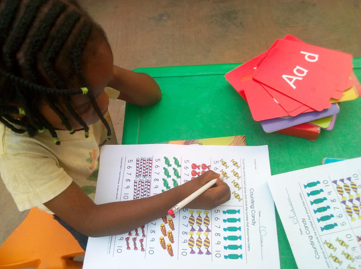 Primary pupil working on numeracy